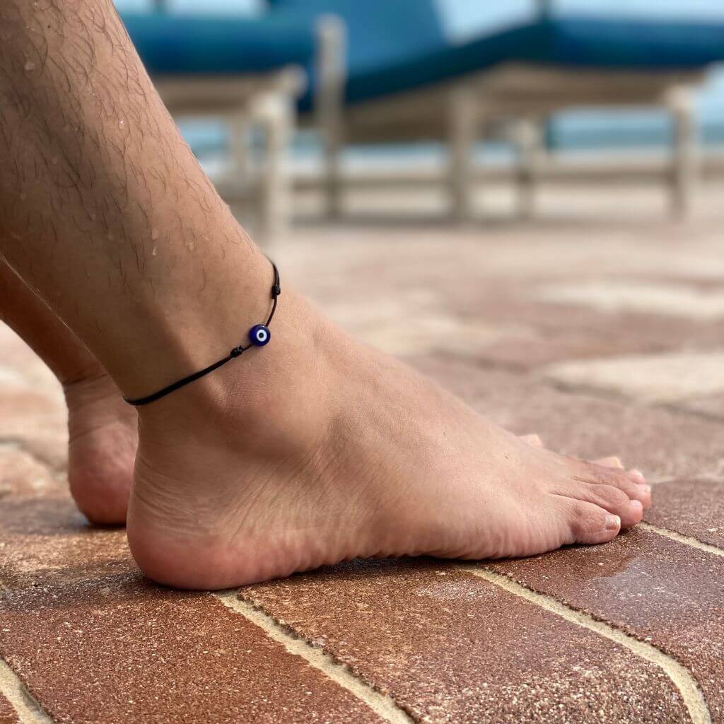Adjustable evil eye anklet with durable cord and protective lucky eye charm, suitable for women, men, and teens. Perfect for beach and outdoor activities - Luck Strings