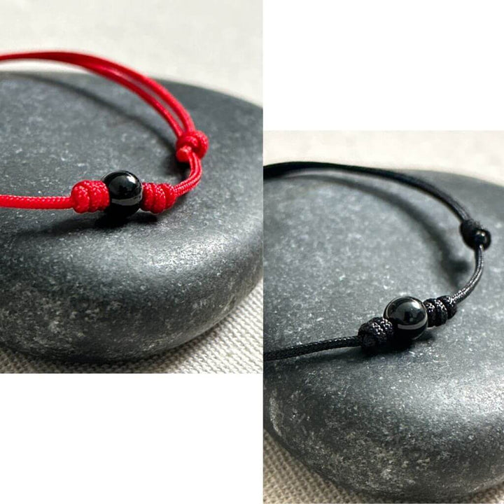 Luck Strings Energy Shield Black Tourmaline Bracelet, a symbol of protection and fortune.