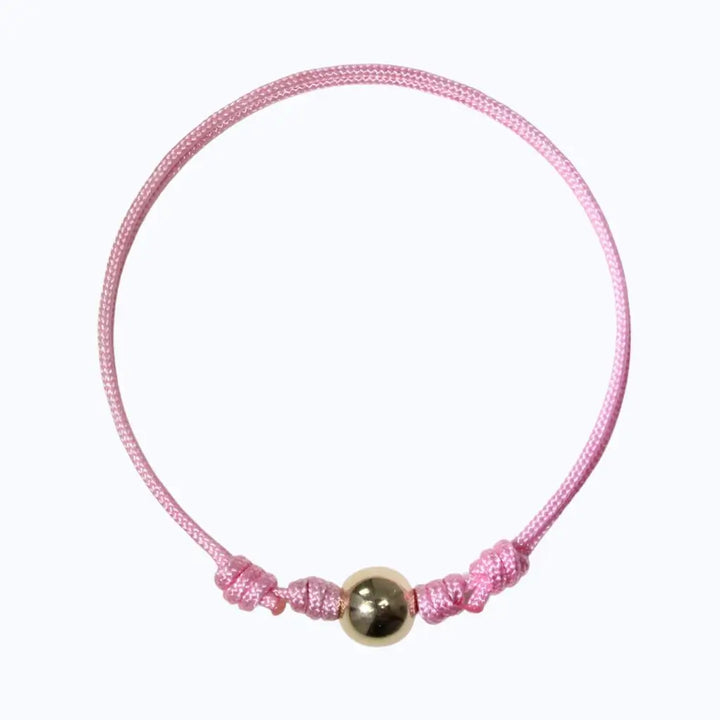 Pink string bracelet with 14K yellow gold bead - Luck Strings