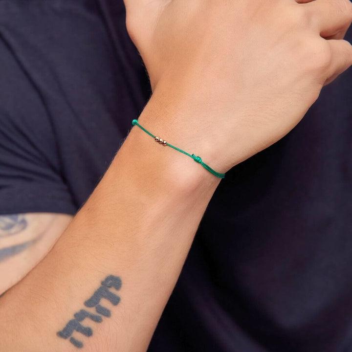 green string solid gold bead ball - Luck Strings