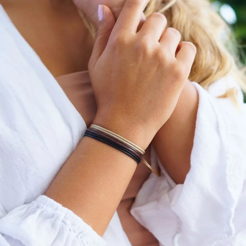 Modeled Black-Brown-Tan Wax Nylon Cord Bracelets