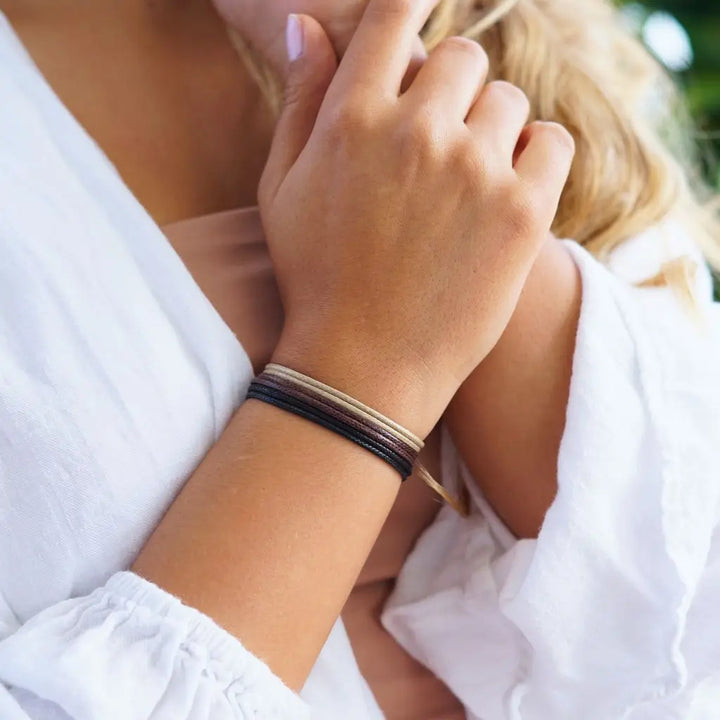 Modeled Black-Brown-Tan Wax Nylon Cord Bracelets