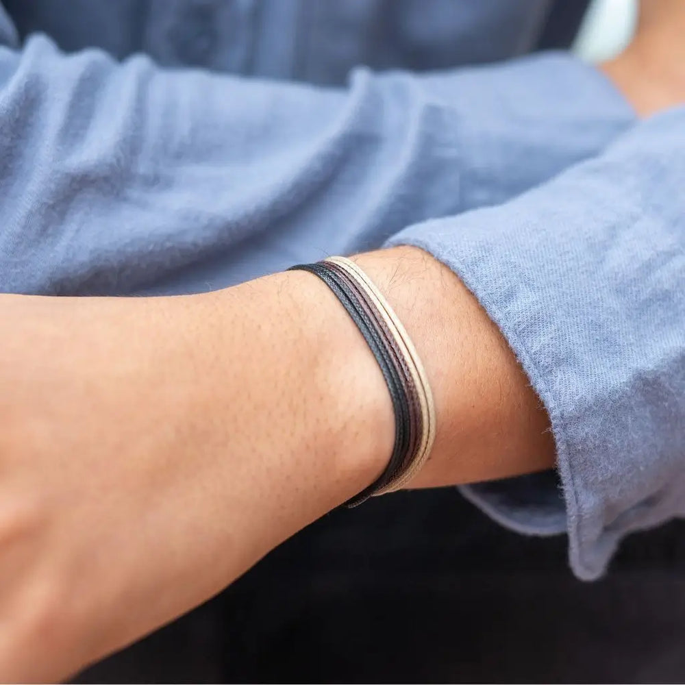 Modeled Black-Brown-Tan Wax Nylon Cord Bracelets