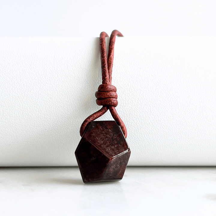 Geometric Garnet Hexagon Pendant - A symbol of love, strength, and elegance by Luck Strings.