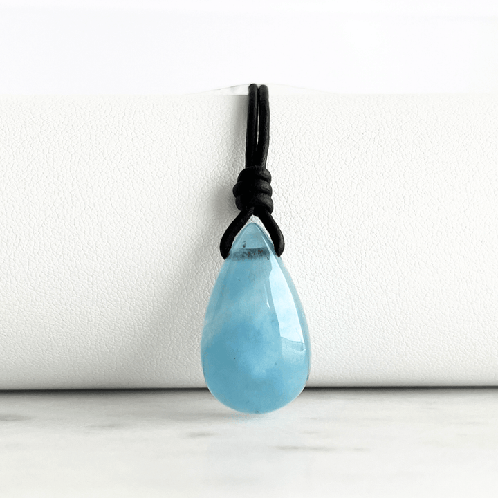 Serene Waters Aquamarine Teardrop Gemstone Pendant: A glistening aquamarine teardrop pendant, reminiscent of calm, tranquil waters.