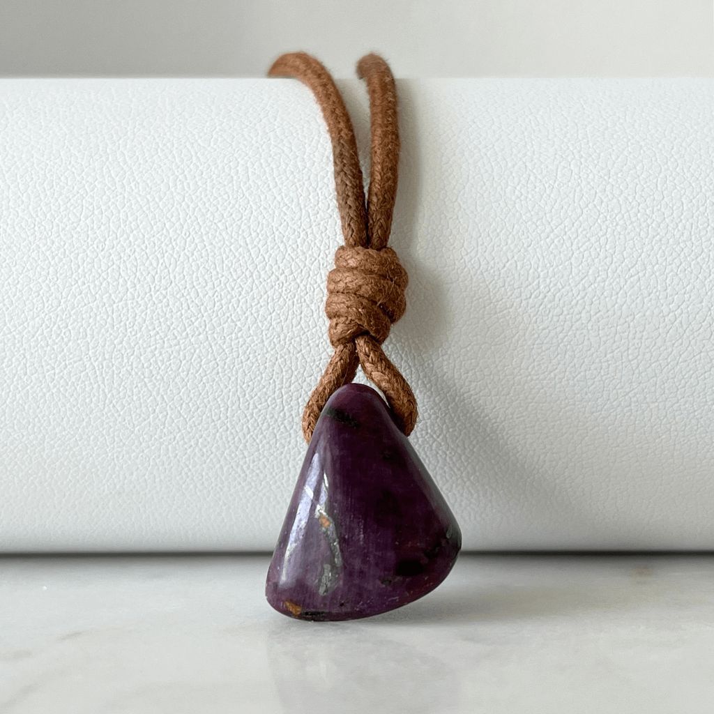 Exquisite Natural Ruby Pendant showcasing a unique, one-of-a-kind deep red gemstone, symbolizing exclusivity and luxury - Luck Strings.