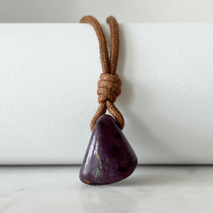 Exquisite Natural Ruby Pendant showcasing a unique, one-of-a-kind deep red gemstone, symbolizing exclusivity and luxury - Luck Strings.