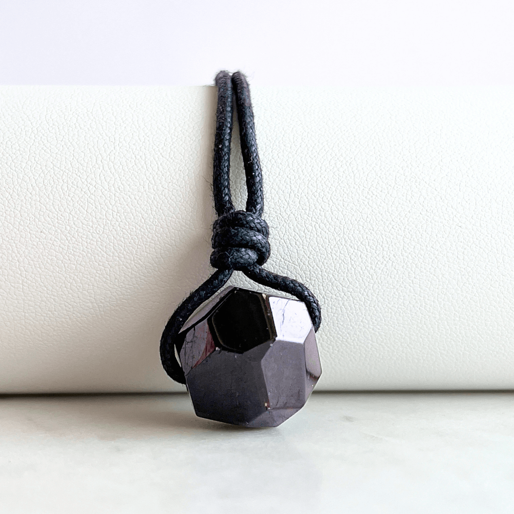Garnet Geometrical Hexagon Pendant - A symbol of love, strength, and elegance by Luck Strings.