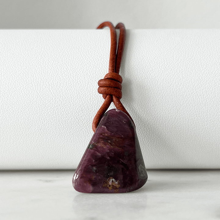 Exclusive One-of-a-Kind Natural Ruby Gemstone Pendant displaying its rich red color and unique beauty, symbolizing passion and elegance - Luck Strings.