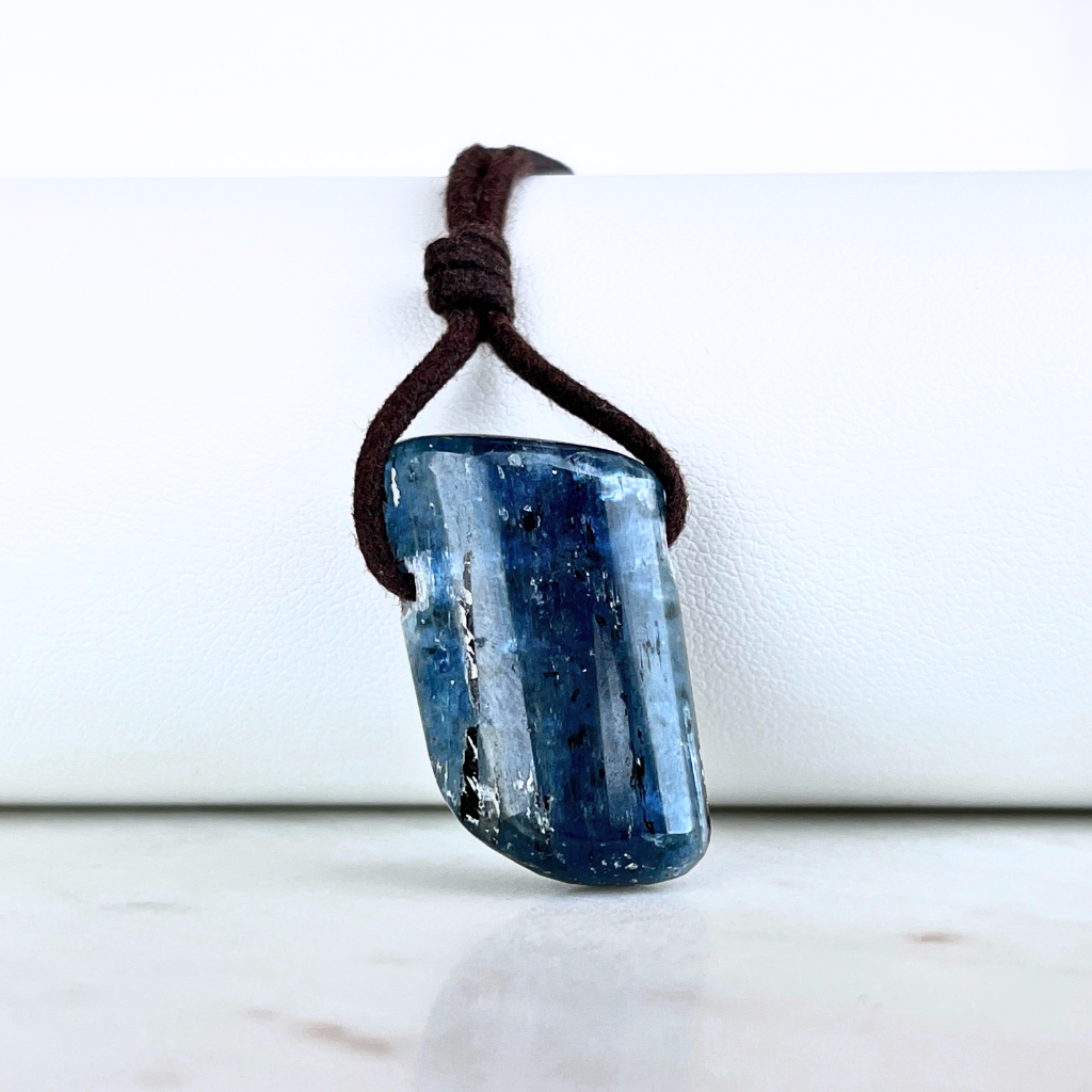 A stunning Kyanite pendant with captivating blue hues, exuding elegance and sophistication.