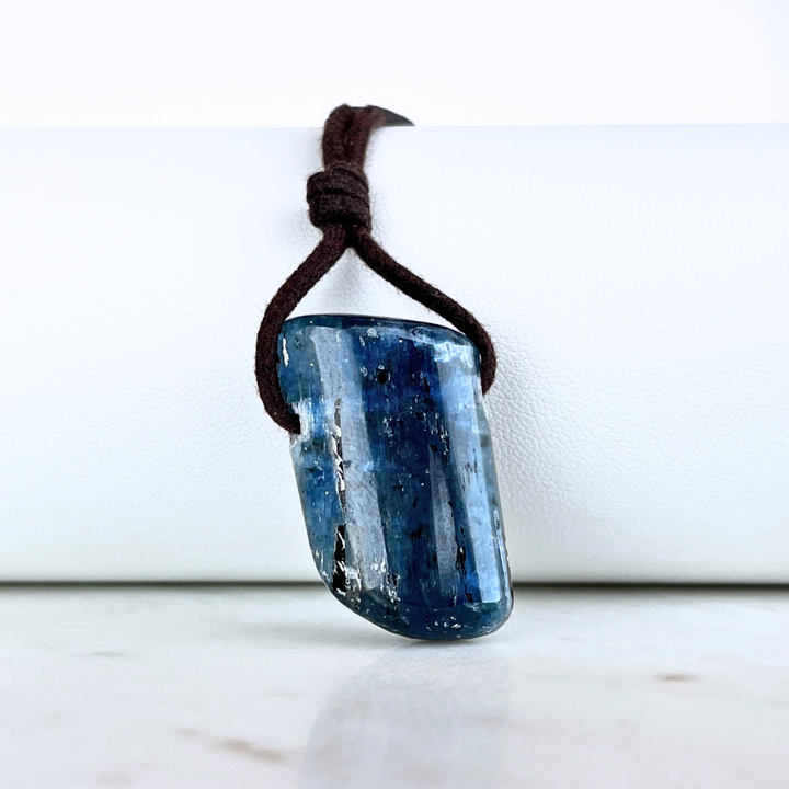 A stunning Kyanite pendant with captivating blue hues, exuding elegance and sophistication.