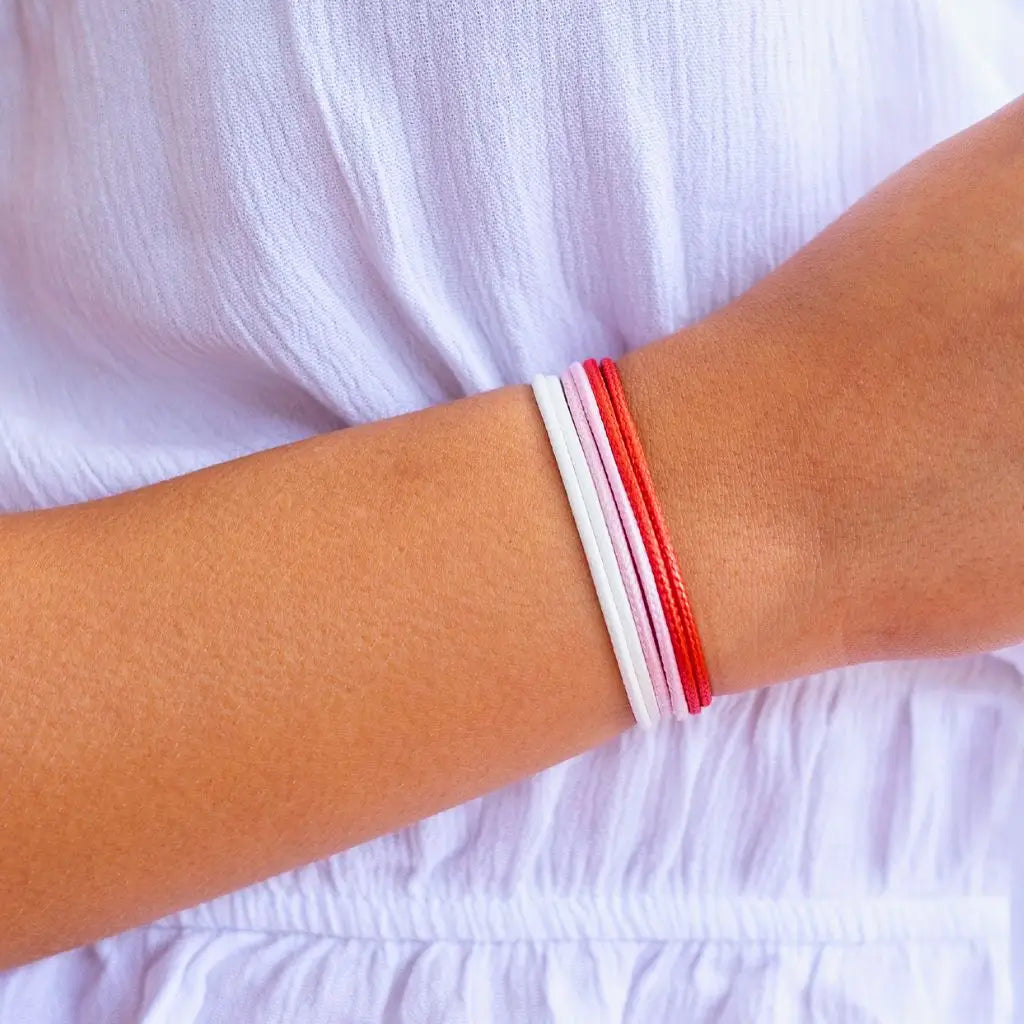 Modeled Red, Pink & White Cord Bracelet Set - Perfect for Vibrant Looks - Luck Strings