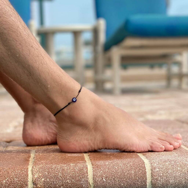Adjustable evil eye anklet with durable cord and protective lucky eye charm, suitable for women, men, and teens. Perfect for beach - Luck Strings