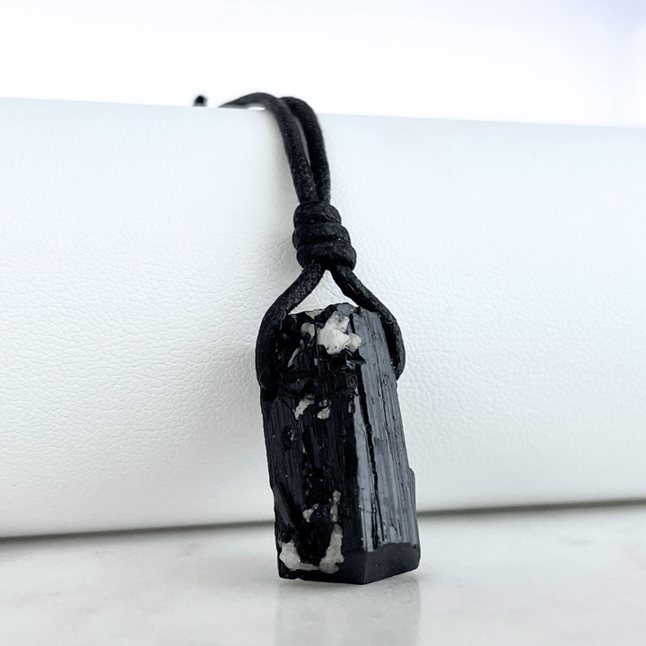 Raw Black Tourmaline Crystal Necklace - A symbol of grounding and transformation by Luck Strings.