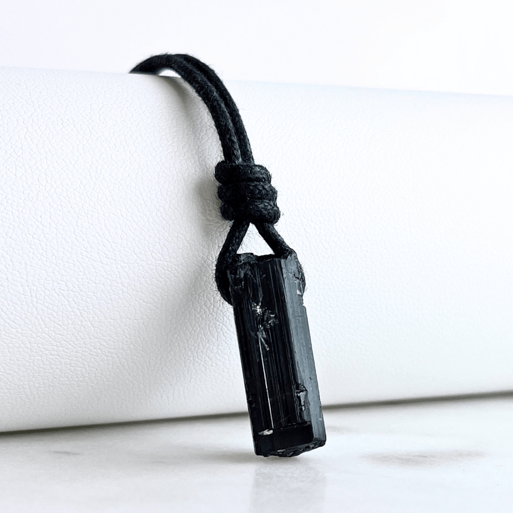 Raw Black Tourmaline OOAK Point Pendant Cord Necklace - A symbol of grounding and vitality by Luck Strings.