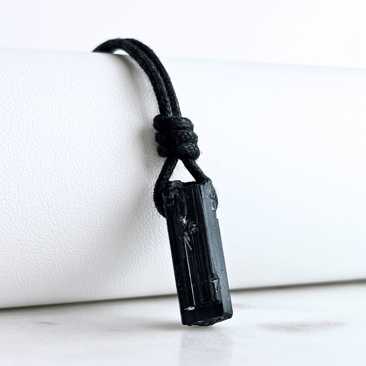 Raw Black Tourmaline OOAK Point Pendant Cord Necklace - A symbol of grounding and vitality by Luck Strings.