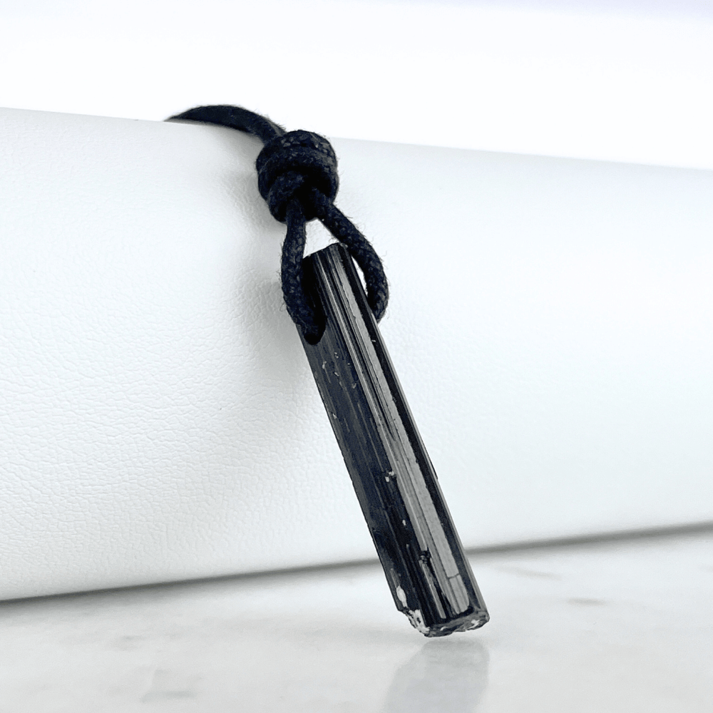 Raw Black Tourmaline Crystal Necklace - A symbol of grounding and transformation by Luck Strings.