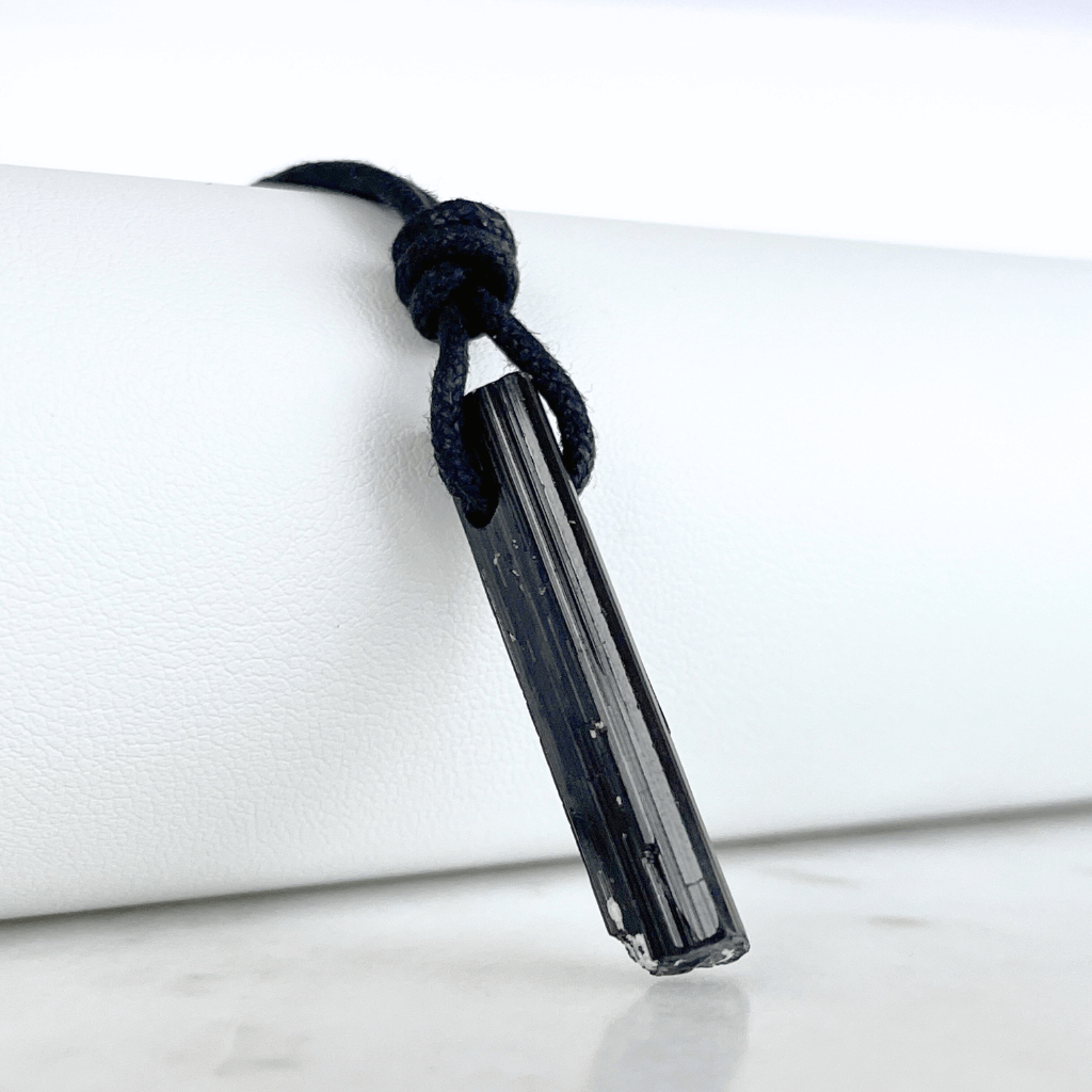 Raw Black Tourmaline Crystal Necklace - A symbol of grounding and transformation by Luck Strings.