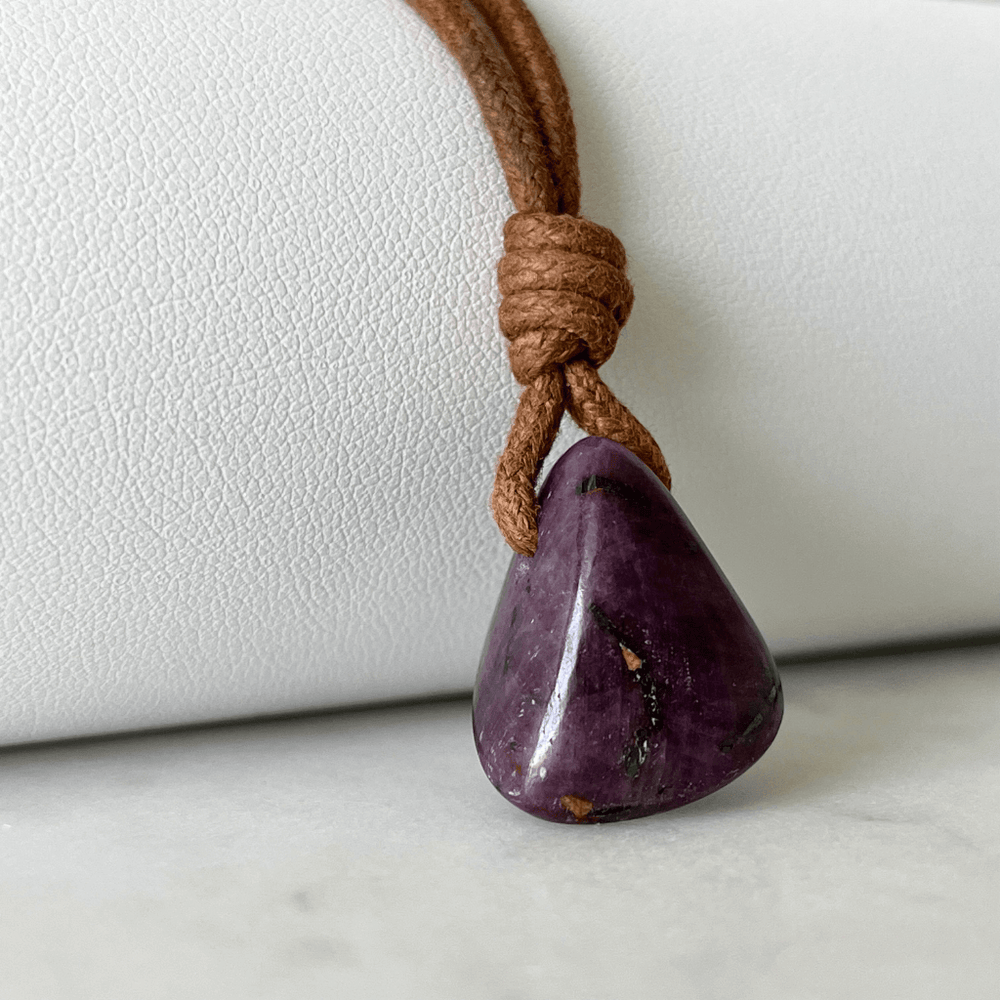 Exquisite Natural Ruby Pendant showcasing a unique, one-of-a-kind deep red gemstone, symbolizing exclusivity and luxury - Luck Strings.