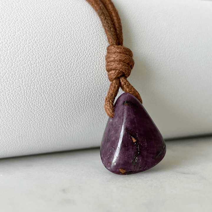 Exquisite Natural Ruby Pendant showcasing a unique, one-of-a-kind deep red gemstone, symbolizing exclusivity and luxury - Luck Strings.