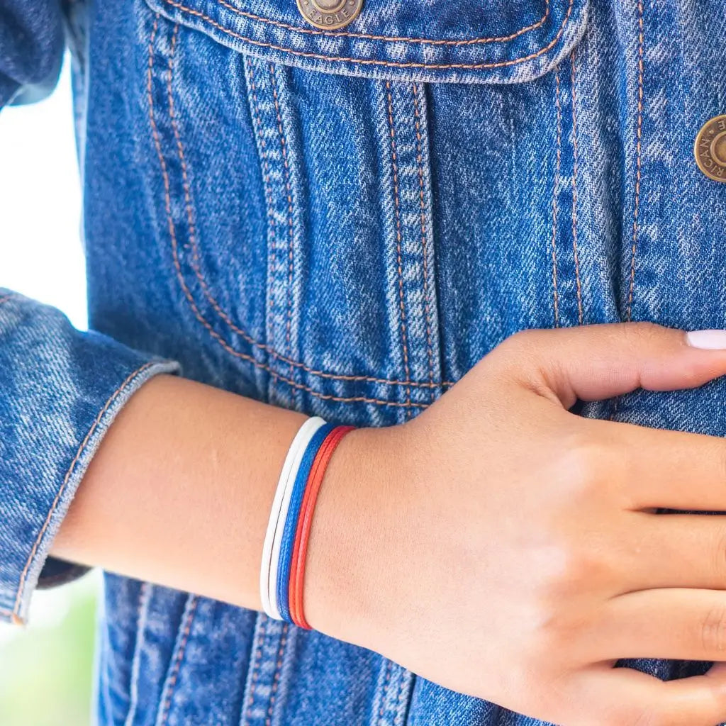 Modeled photo of Red-Navy-White Wax Nylon Cord Bracelets - Luck Strings