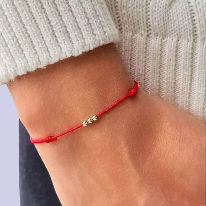 red string solid gold bead ball - Luck Strings