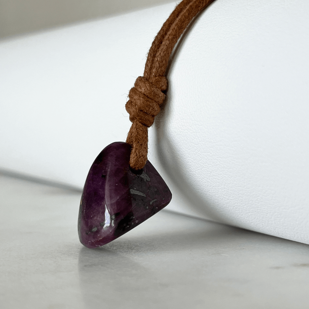 Exquisite Natural Ruby Pendant showcasing a unique, one-of-a-kind deep red gemstone, symbolizing exclusivity and luxury - Luck Strings.