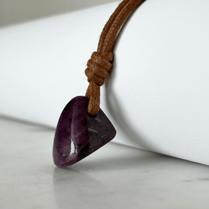 Exquisite Natural Ruby Pendant showcasing a unique, one-of-a-kind deep red gemstone, symbolizing exclusivity and luxury - Luck Strings.