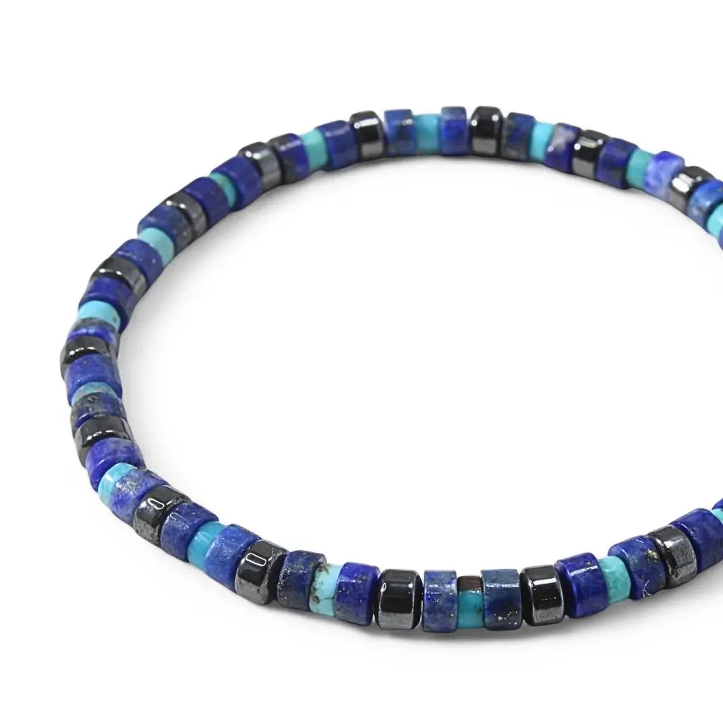 Stretch bracelet with 4mm lapis lazuli, 3mm turquoise, and hematite beads, featuring natural gemstone accents. Luck Strings