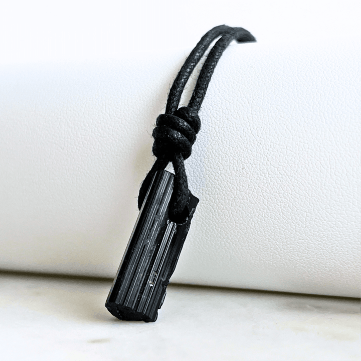 Raw Black Tourmaline OOAK Point Pendant Cord Necklace - A symbol of grounding and vitality by Luck Strings.