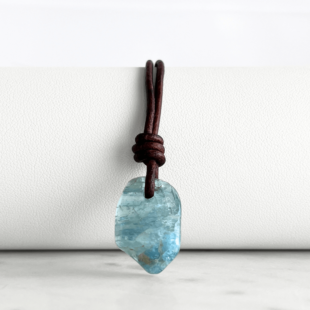 Inner Serenity: A pendant necklace featuring a natural small aquamarine gemstone, symbolizing inner calm and tranquility.