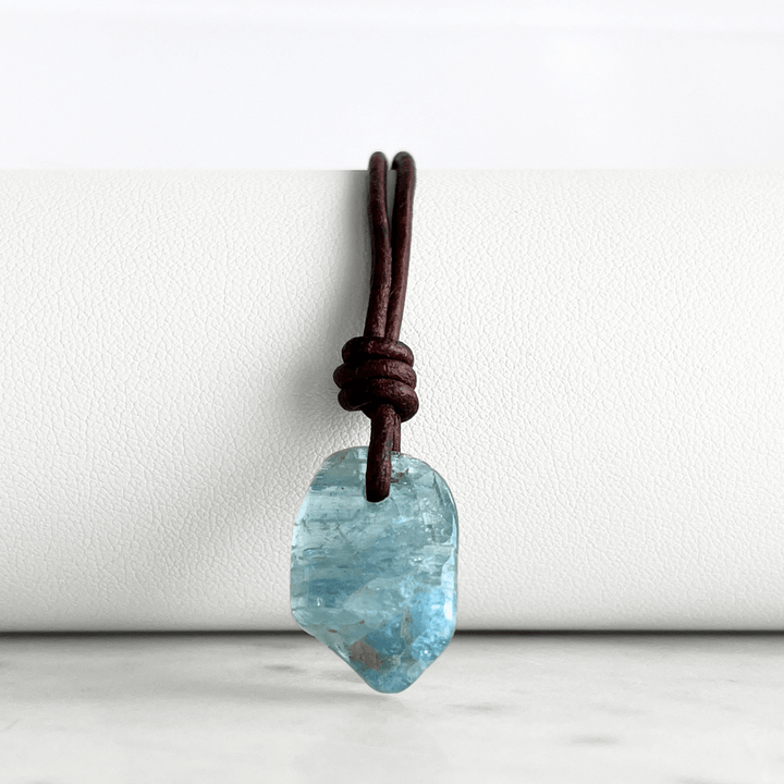 Inner Serenity: A pendant necklace featuring a natural small aquamarine gemstone, symbolizing inner calm and tranquility.