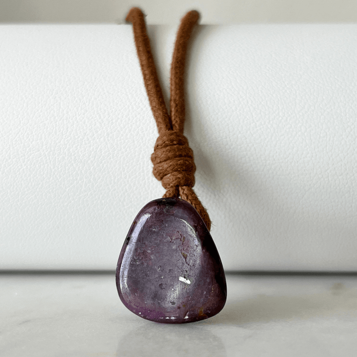 Exquisite Natural Ruby Pendant showcasing a unique, one-of-a-kind deep red gemstone, symbolizing exclusivity and luxury - Luck Strings.