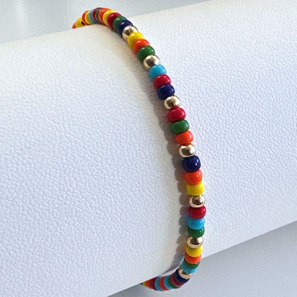 14K Gold Rainbow Beaded Bracelet on display, highlighting the vibrant colors and high-quality design - Luck Strings