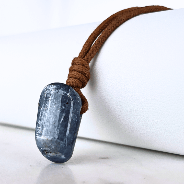 A beautiful OOAK Kyanite gemstone pendant featuring captivating blue shades, radiating beauty and uniqueness.