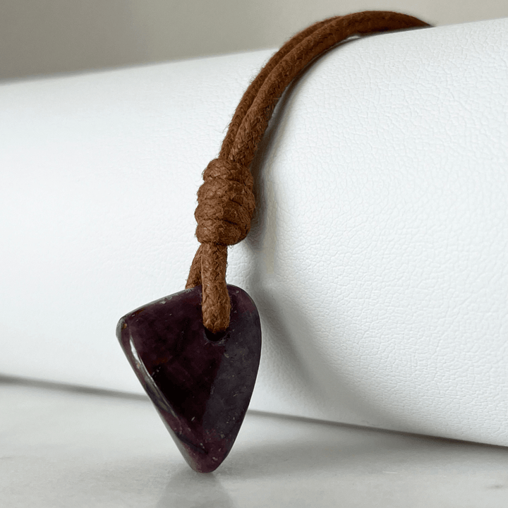 Exquisite Natural Ruby Pendant showcasing a unique, one-of-a-kind deep red gemstone, symbolizing exclusivity and luxury - Luck Strings.