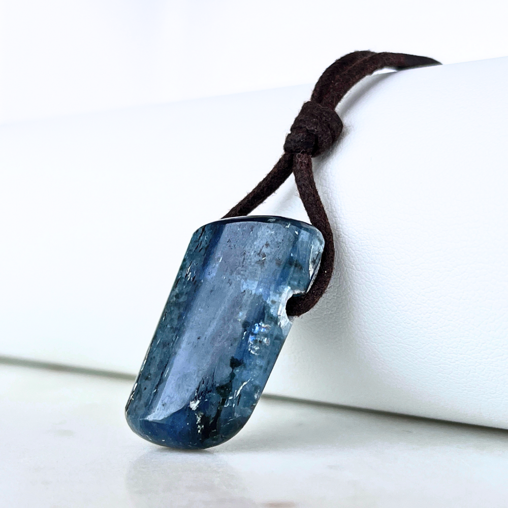 A stunning Kyanite pendant with captivating blue hues, exuding elegance and sophistication.