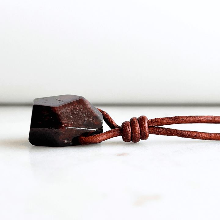 Geometric Garnet Hexagon Pendant - A symbol of love, strength, and elegance by Luck Strings.
