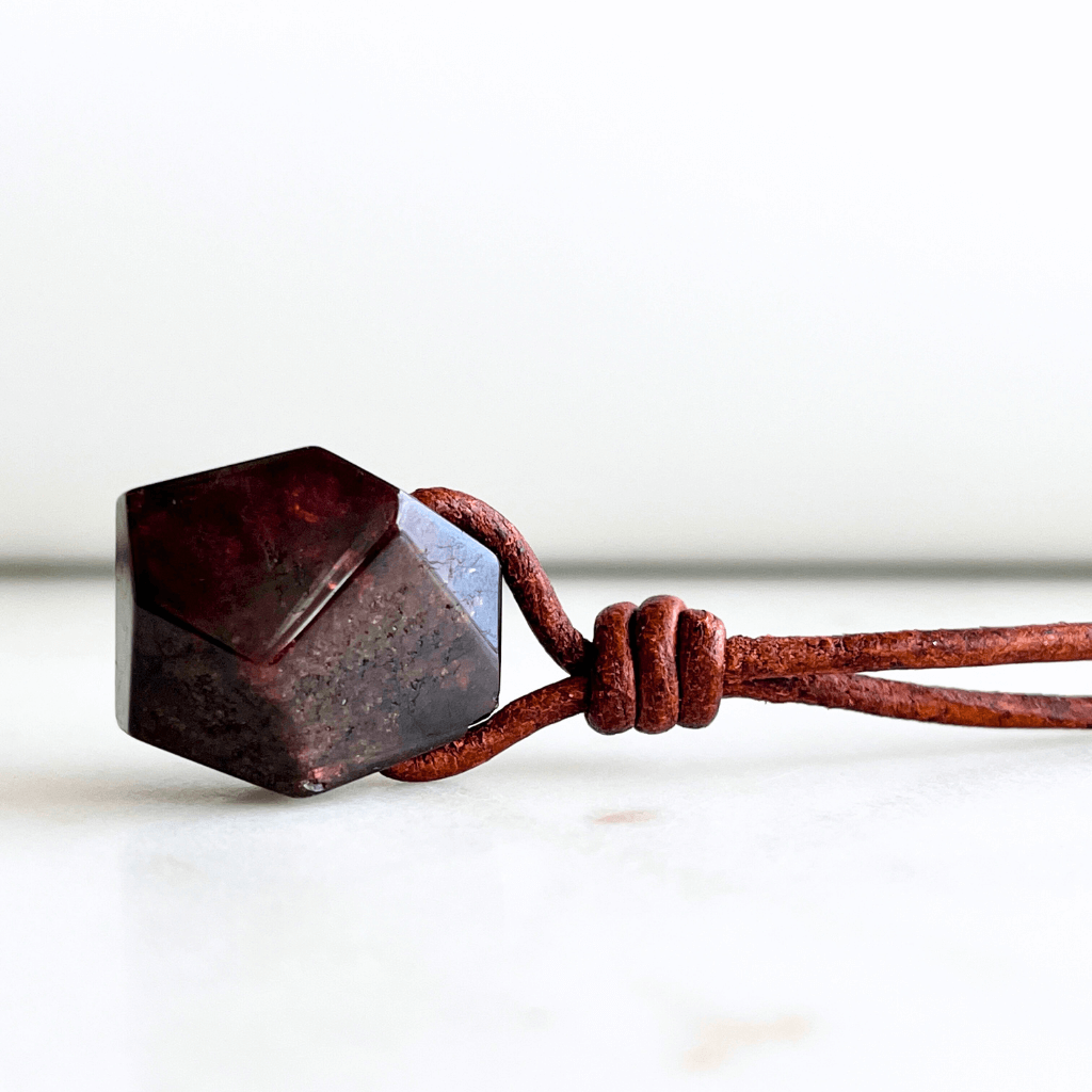 Geometric Garnet Hexagon Pendant - A symbol of love, strength, and elegance by Luck Strings.