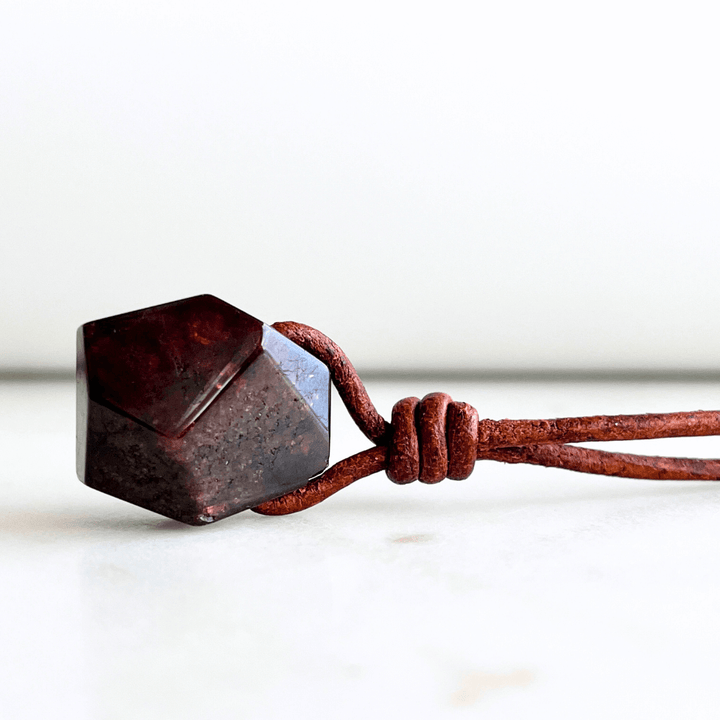 Geometric Garnet Hexagon Pendant - A symbol of love, strength, and elegance by Luck Strings.