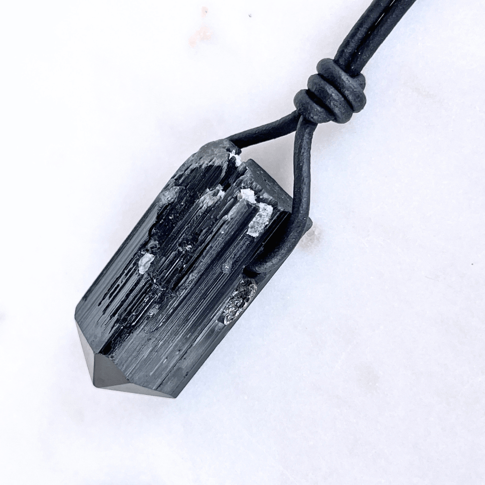 Raw Black Tourmaline Charm Necklace - A symbol of protection and positivity by Luck Strings.