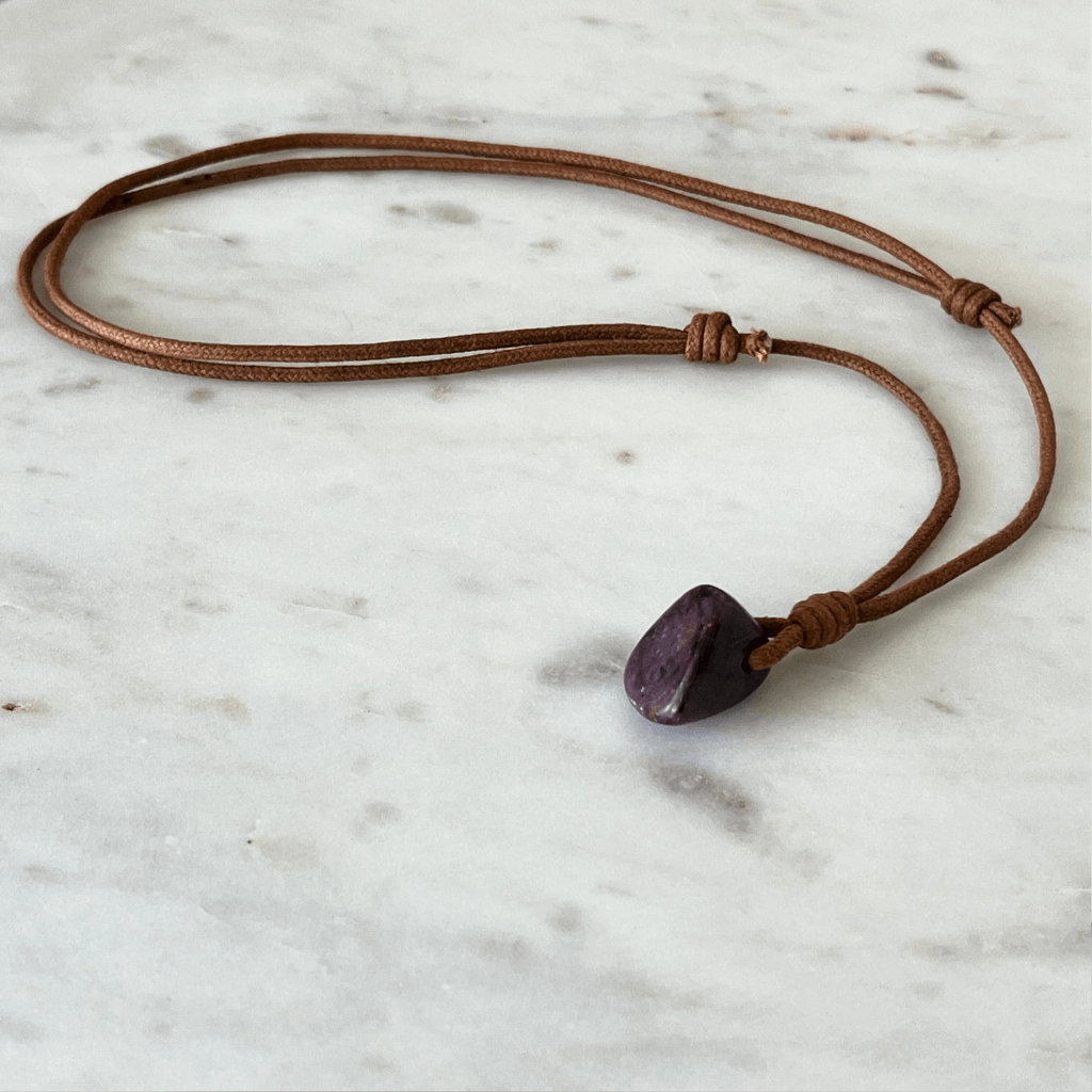 Exquisite Natural Ruby Pendant showcasing a unique, one-of-a-kind deep red gemstone, symbolizing exclusivity and luxury - Luck Strings.