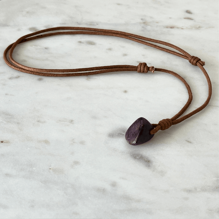 Exquisite Natural Ruby Pendant showcasing a unique, one-of-a-kind deep red gemstone, symbolizing exclusivity and luxury - Luck Strings.