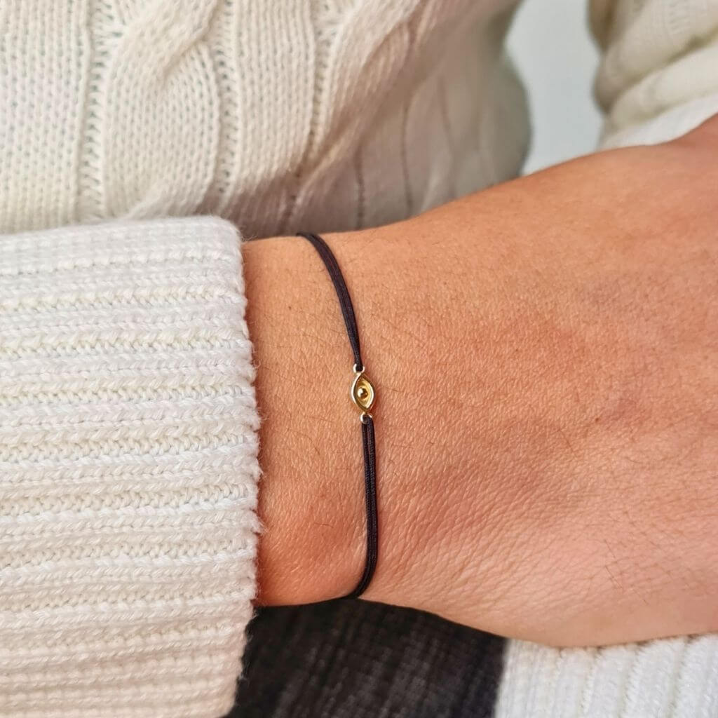 Adjustable macrame knots to fit most wrist sizes.