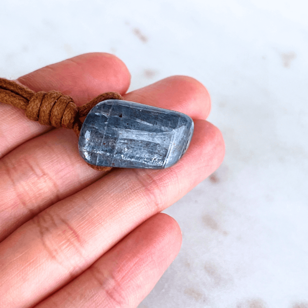 A beautiful OOAK Kyanite gemstone pendant featuring captivating blue shades, radiating beauty and uniqueness.