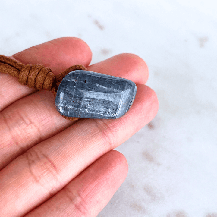 A beautiful OOAK Kyanite gemstone pendant featuring captivating blue shades, radiating beauty and uniqueness.