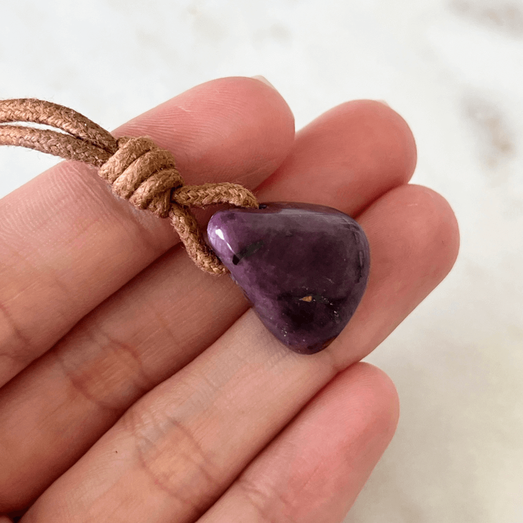 Exquisite Natural Ruby Pendant showcasing a unique, one-of-a-kind deep red gemstone, symbolizing exclusivity and luxury - Luck Strings.