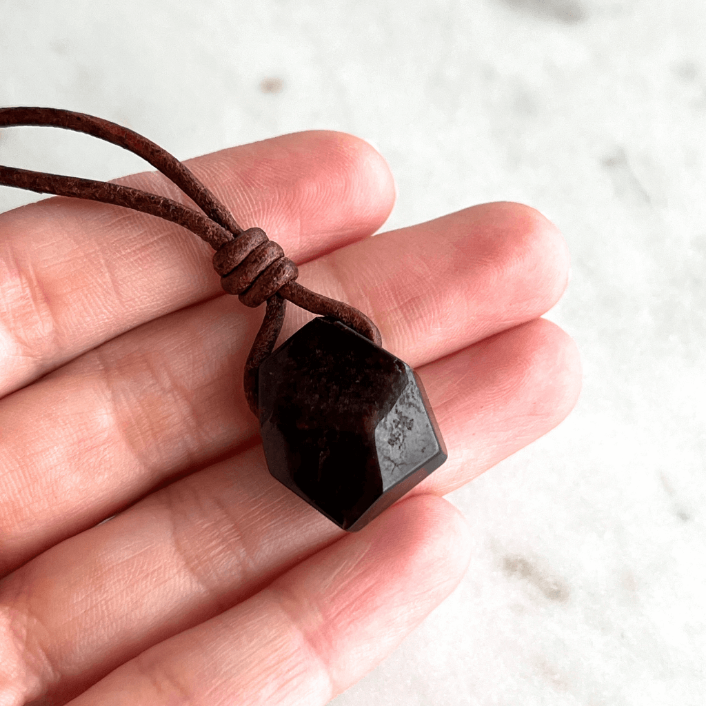 Geometric Garnet Hexagon Pendant - A symbol of love, strength, and elegance by Luck Strings.