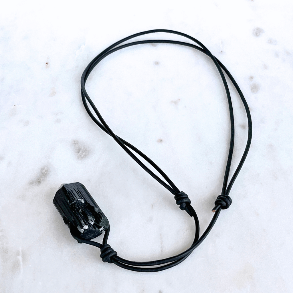 Raw Black Tourmaline Charm Necklace - A symbol of protection and positivity by Luck Strings.