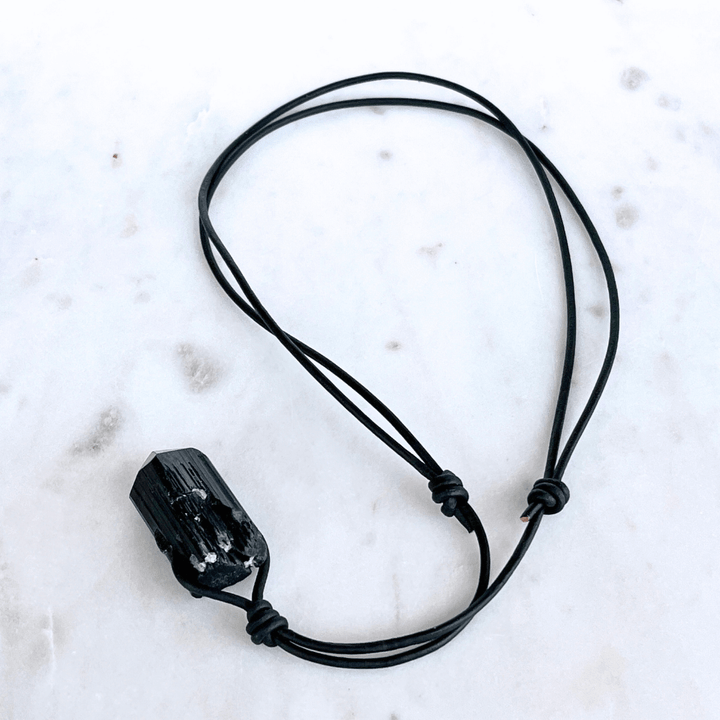 Raw Black Tourmaline Charm Necklace - A symbol of protection and positivity by Luck Strings.